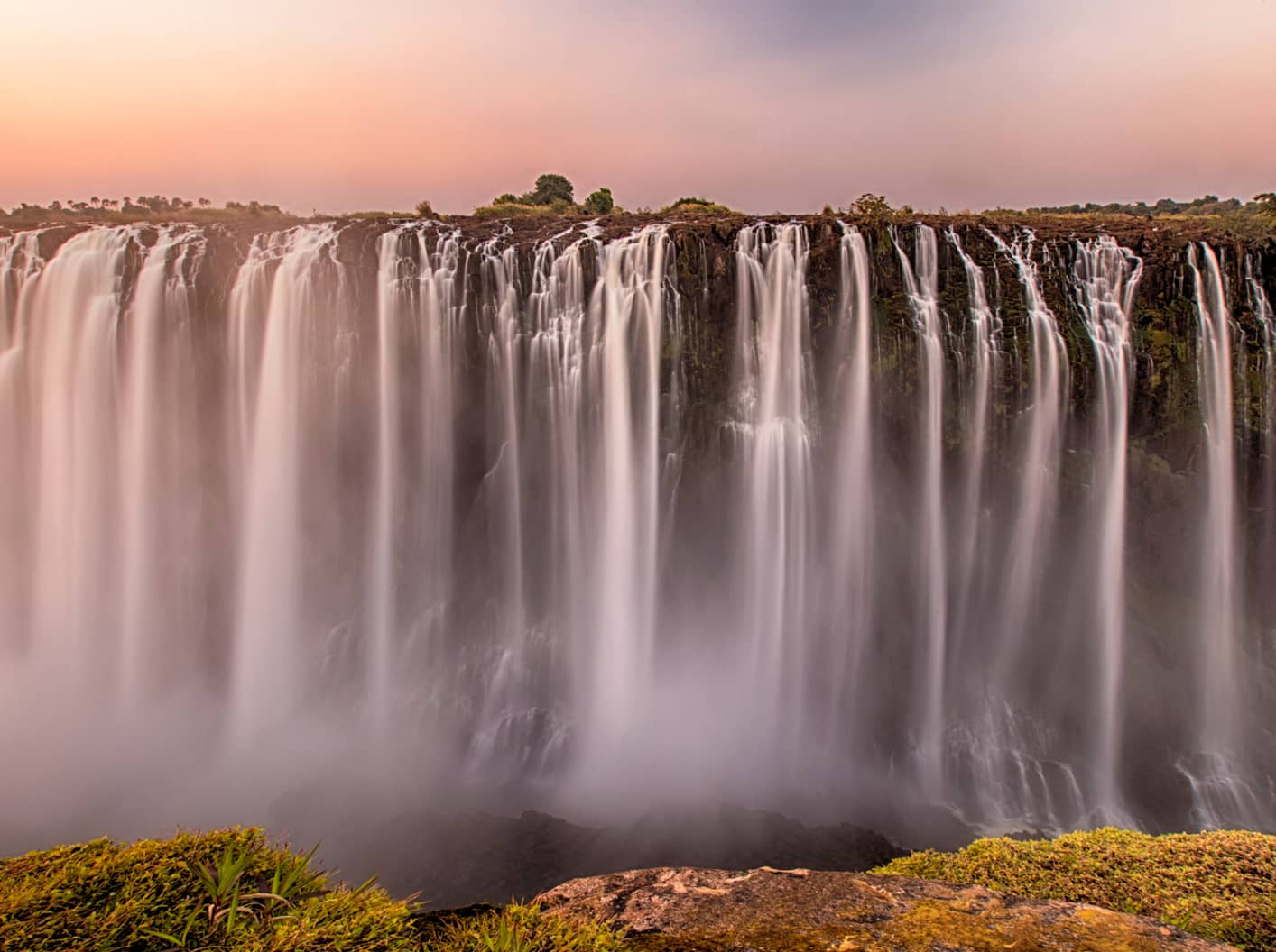  Marvel at Victoria Falls, a natural wonder of the world.  