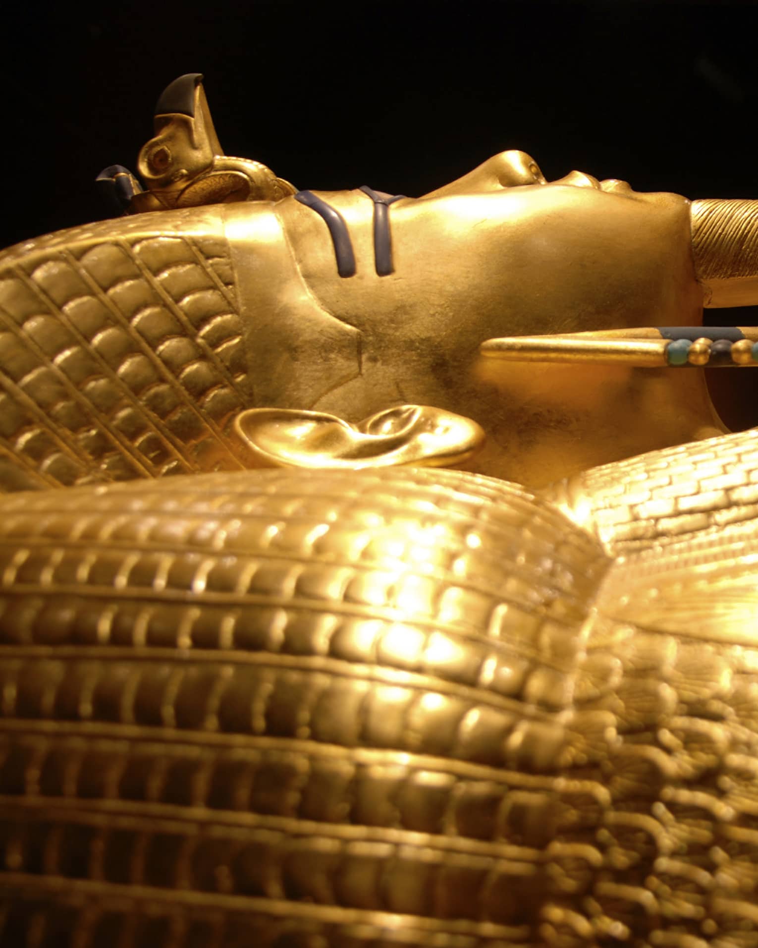 Side view of gold Pharaoh King Tutankhamun tomb in Cairo Egyptian Museum