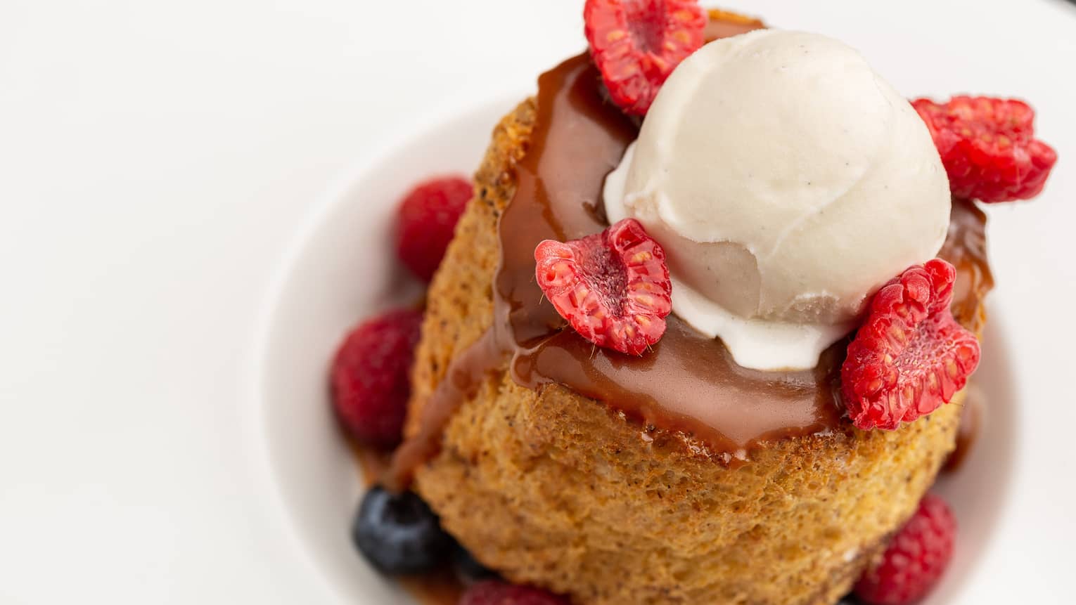 French toast with arabica coffee, mixed berries and vanilla ice cream