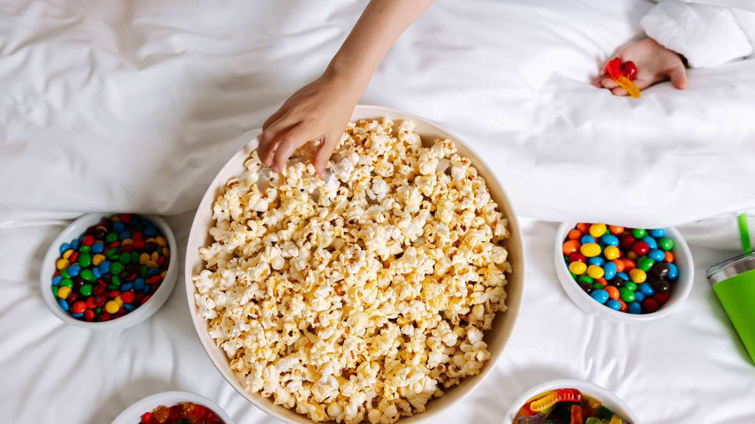 Bowls of popcorn and candy.