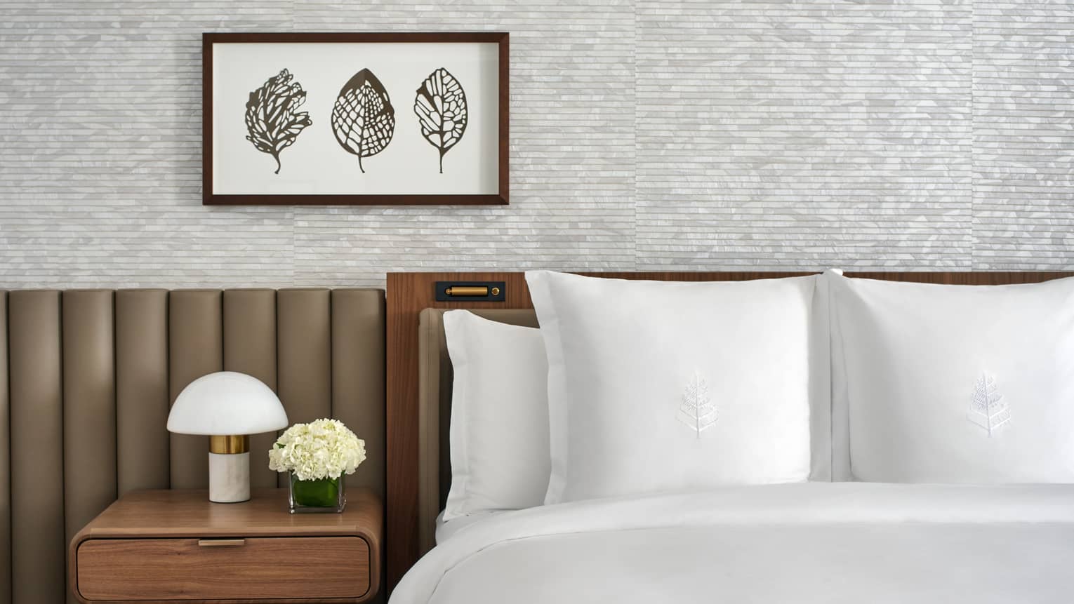 Luxury hotel room with king bed and white Four Seasons?embroidered sheets, at Four Seasons Hotel Washington, DC