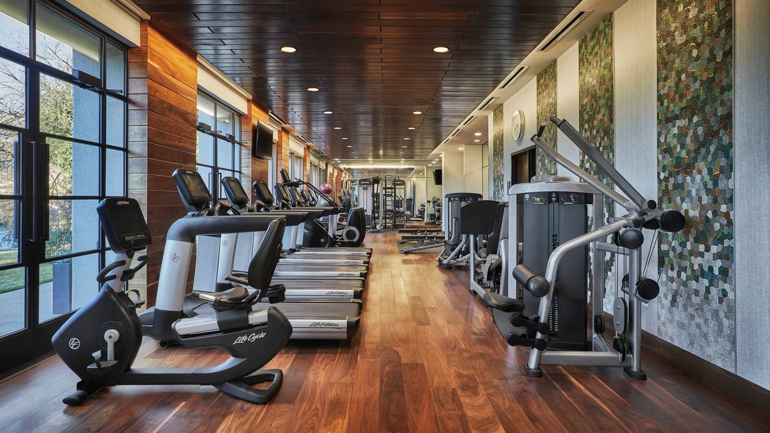 Treadmills, cardio machines, weight stations line long Fitness Centre