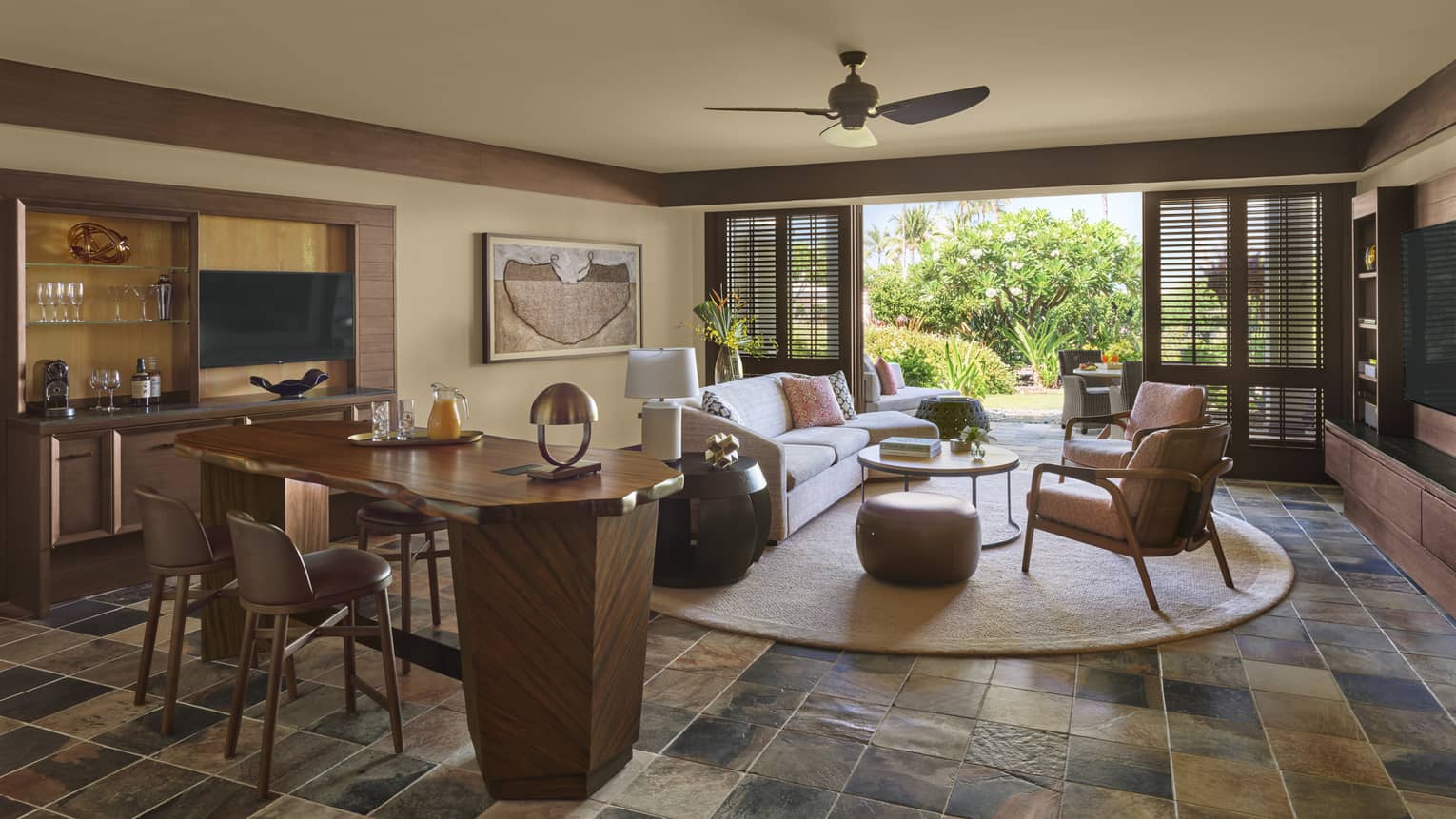 Living area with tile floor and walk-out terrace