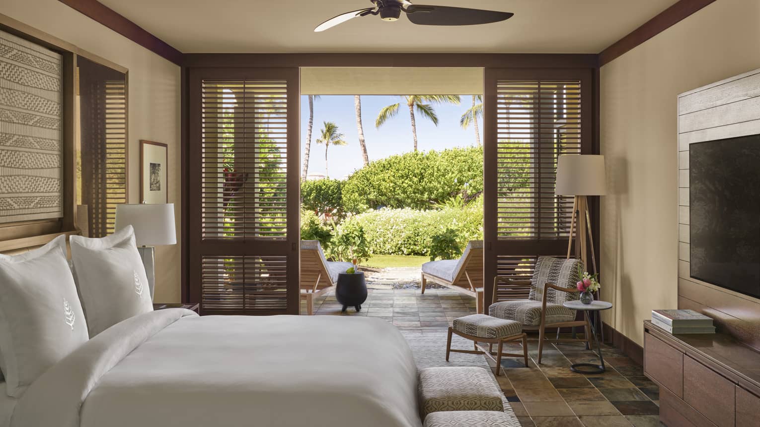 Bedroom with shutter doors and walk-out terrace