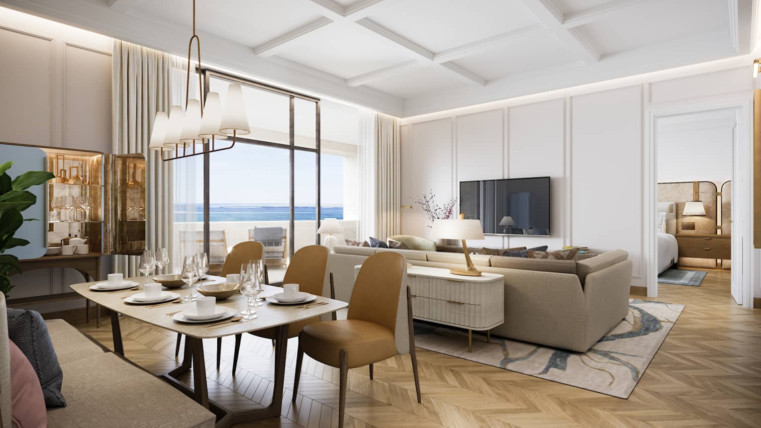 Large living and dining area with floor-to-ceiling windows and walkout to the beach.
