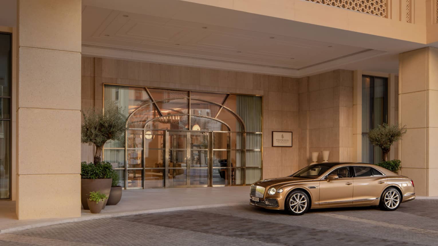 Luxury car parks outside entrance of Four Seasons Resort and Residences The Pearl-Qatar, Doha
