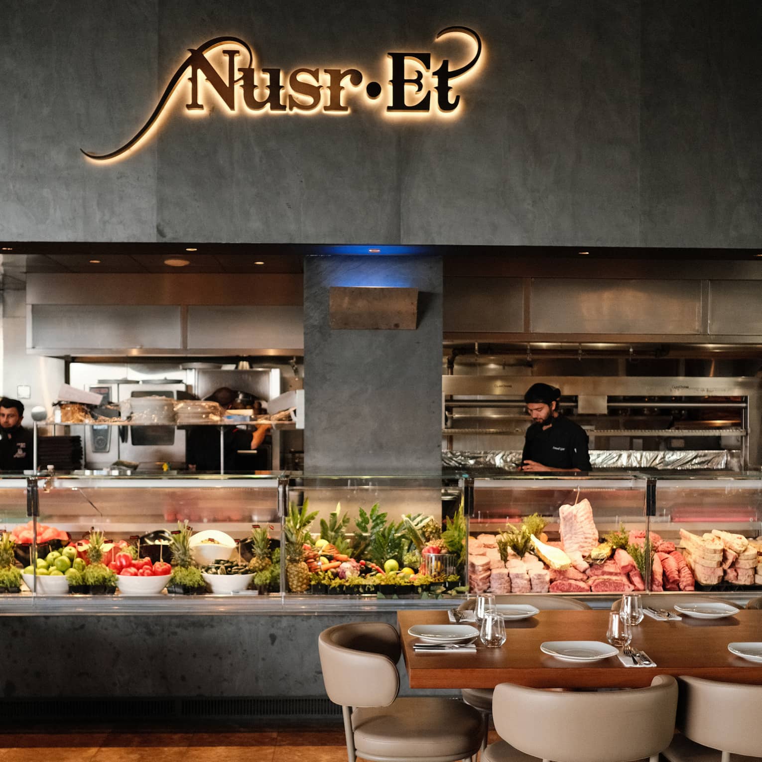 Open kitchen counter at Nusr-Et restaurant, with a display of meat