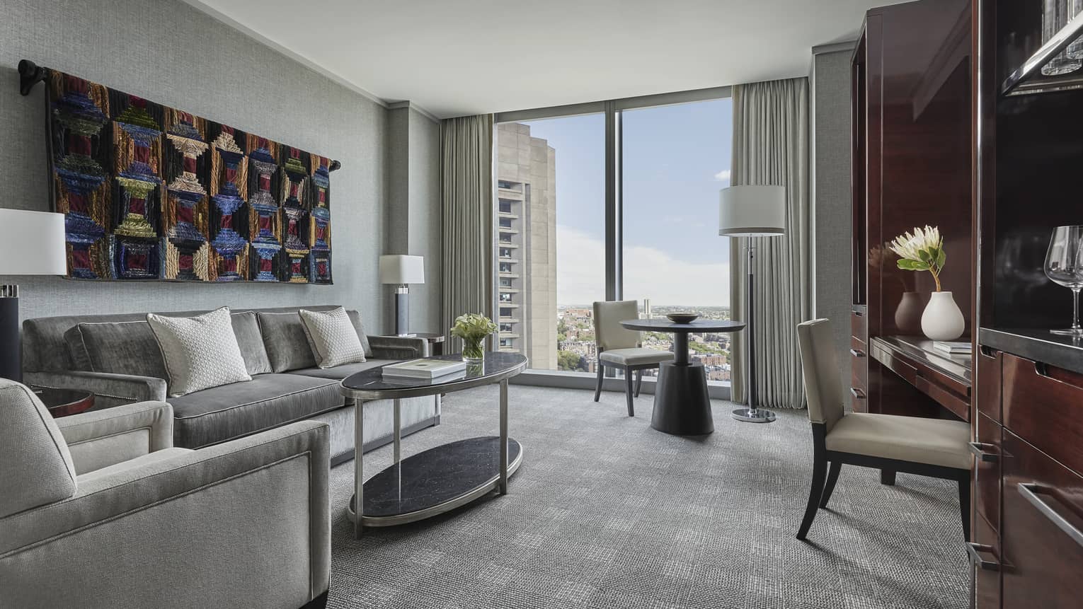 Guest sitting area in the corner suite at four seasons boston one dalton