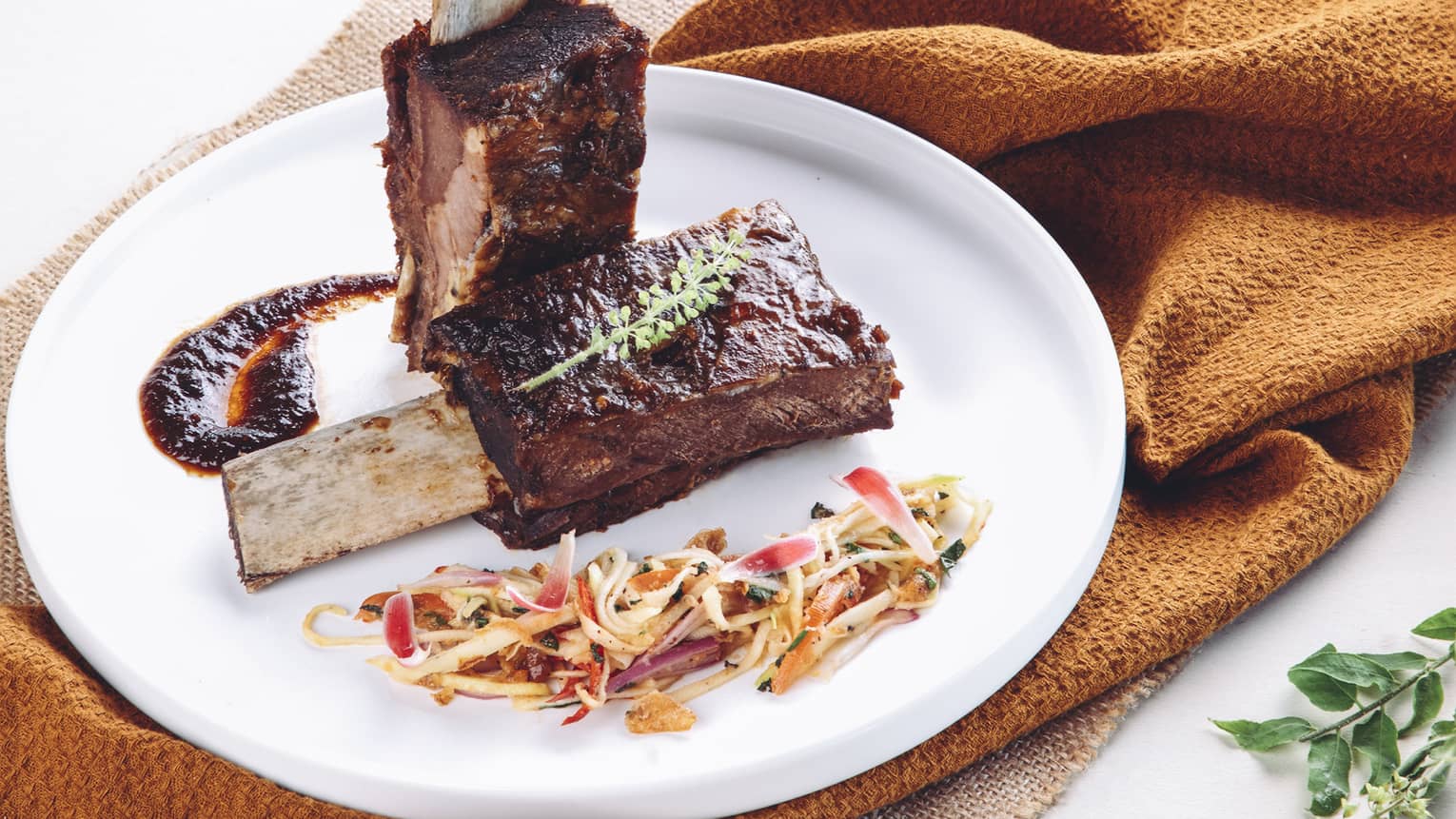 Slow-roasted Short Ribs, Sweet Soy Glaze, Local Herb Salad