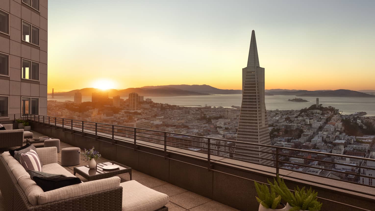 Golden Gate Terrace Suite balcony overlooking San Francisco Bay at sunset