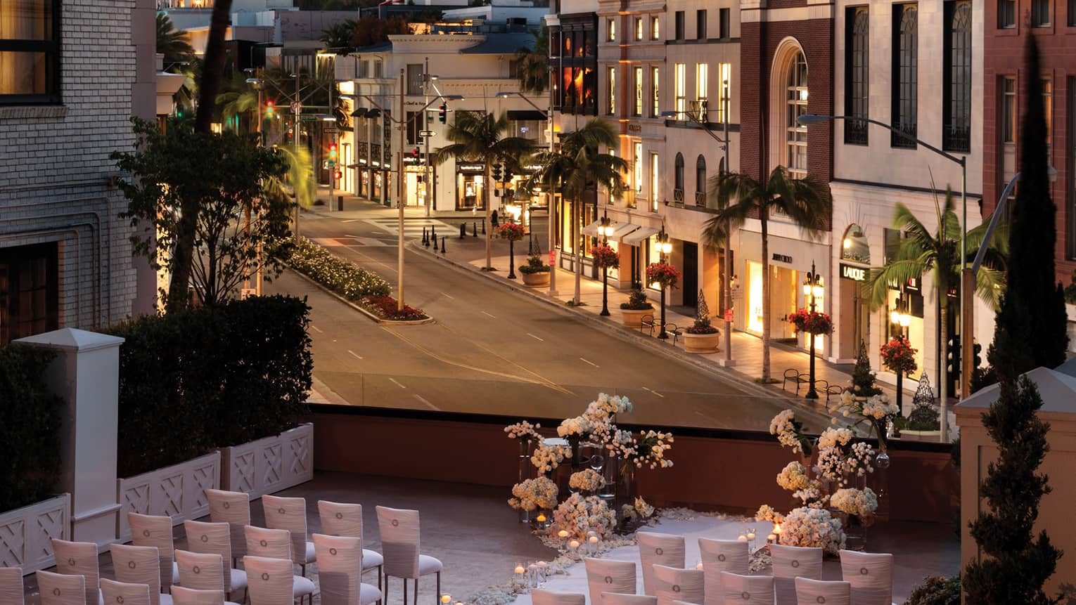 Wedding set up on terrace above Beverly Hills street view at sunset 