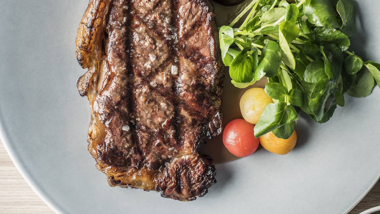 Westtholme wagyu striploin with tarragon emulsion and fries