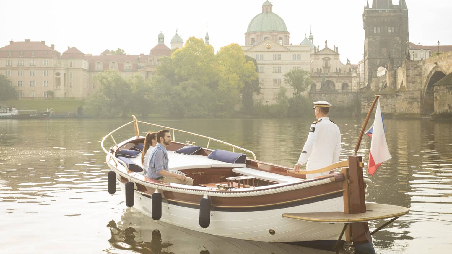 Couple enjoying river boat trip in Prague
