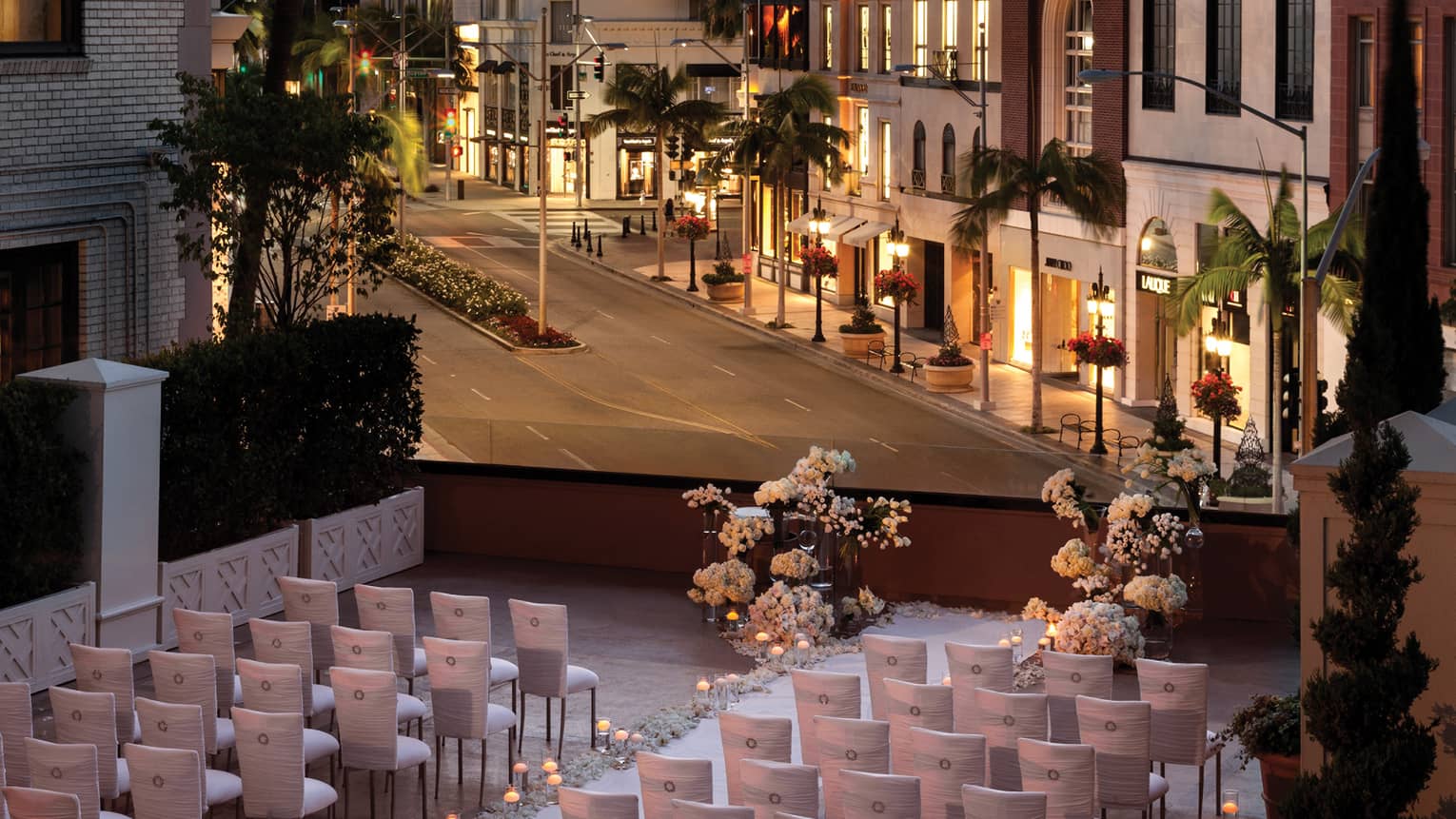Wedding set up on terrace above Beverly Hills street view at sunset 