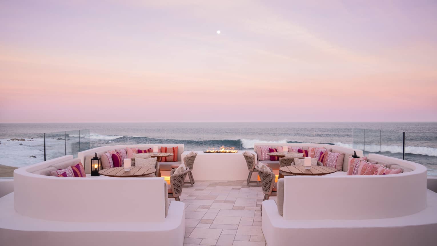 Chic rooftop bar with ocean view at dusk at Four Seasons Resort and Residences Cabo San Lucas