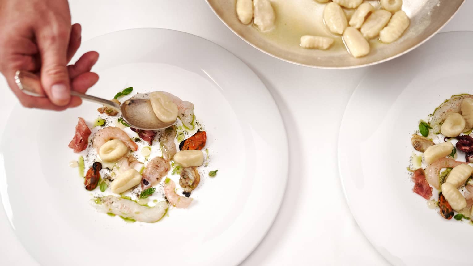 Gnocchi with raw seafood.