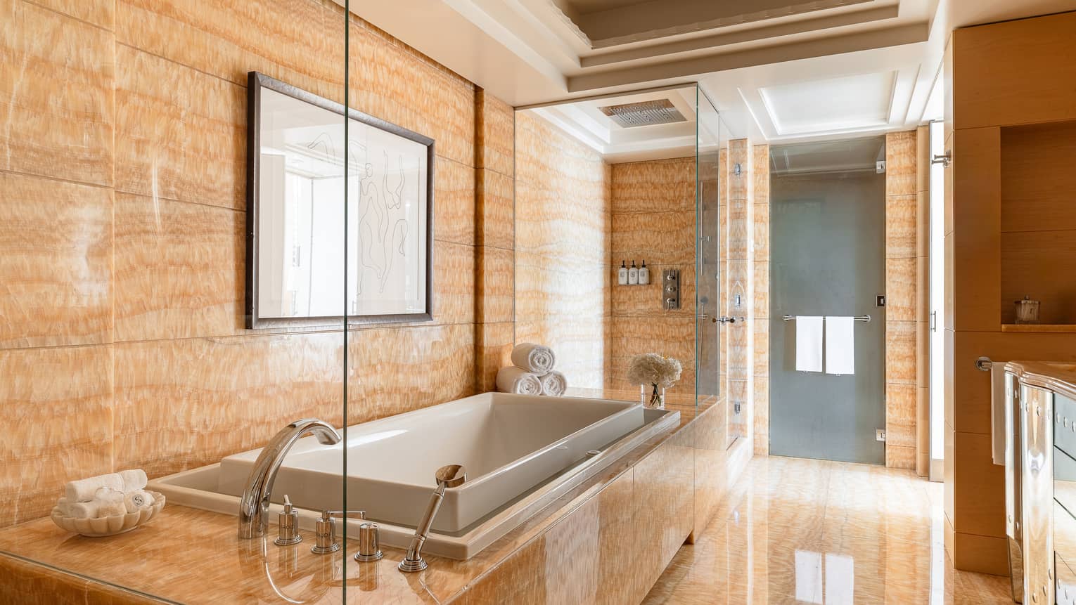 Large luxury bathroom with deep soaking tub in Presidential Suite of Four Seasons Hotel des Bergues, Geneva