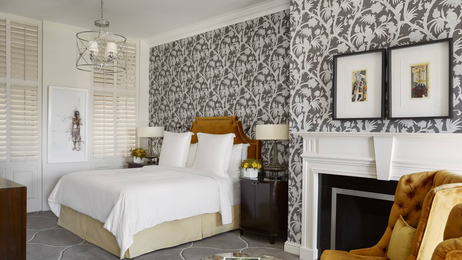 Luxury hotel suite bedroom with floral, grey and white wallpaper, at Four Seasons Hotel Johannesburg
