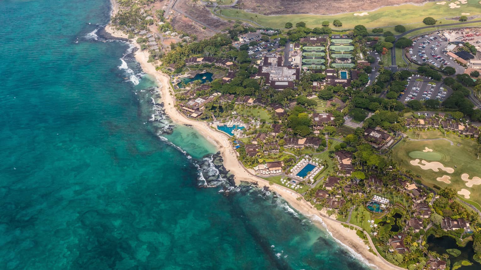 Aerial view of Four Seasons Resort Hualalai, beach and shoreline