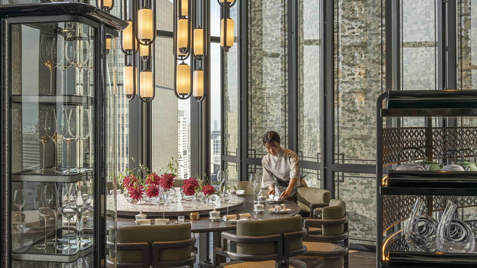 Light-filled dining area inside Jiang Nan Chun restaurant at Four Seasons Hotel Osaka