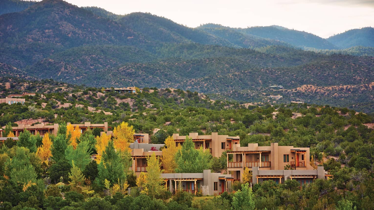 Aerial view of Four Seasons Resort Santa Fe in desert mountains