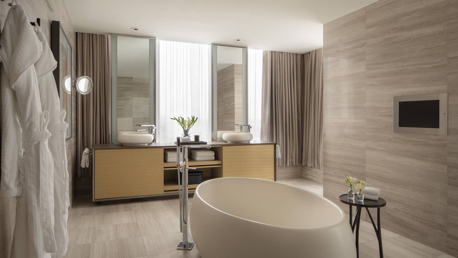 Presidential Suite bathroom with standalone luxury tub at Four Seasons Hotel Toronto