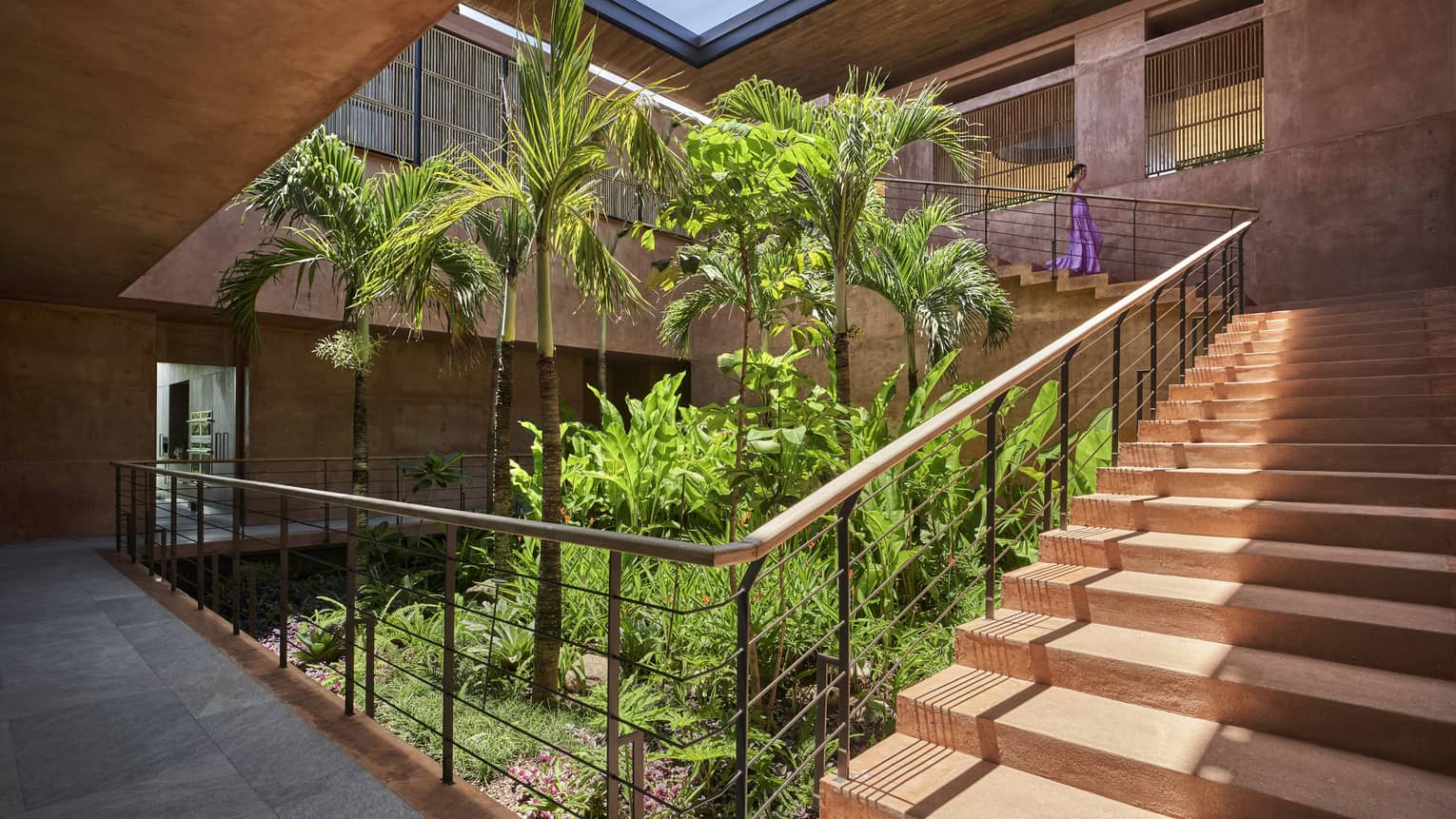 Stairs surrounding an internal courtyard garden of a private villa