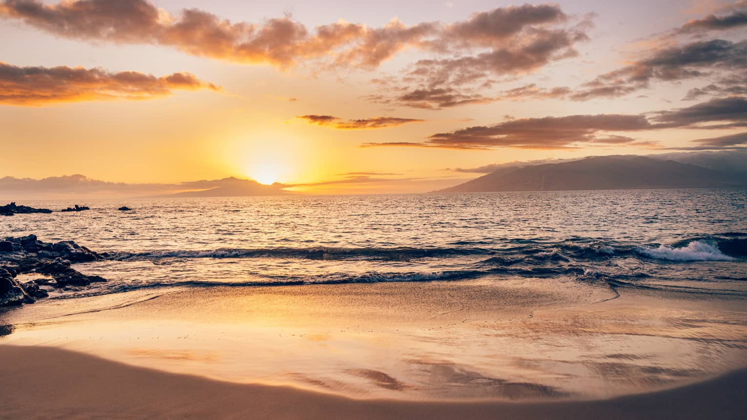 A sunrise on a beach.
