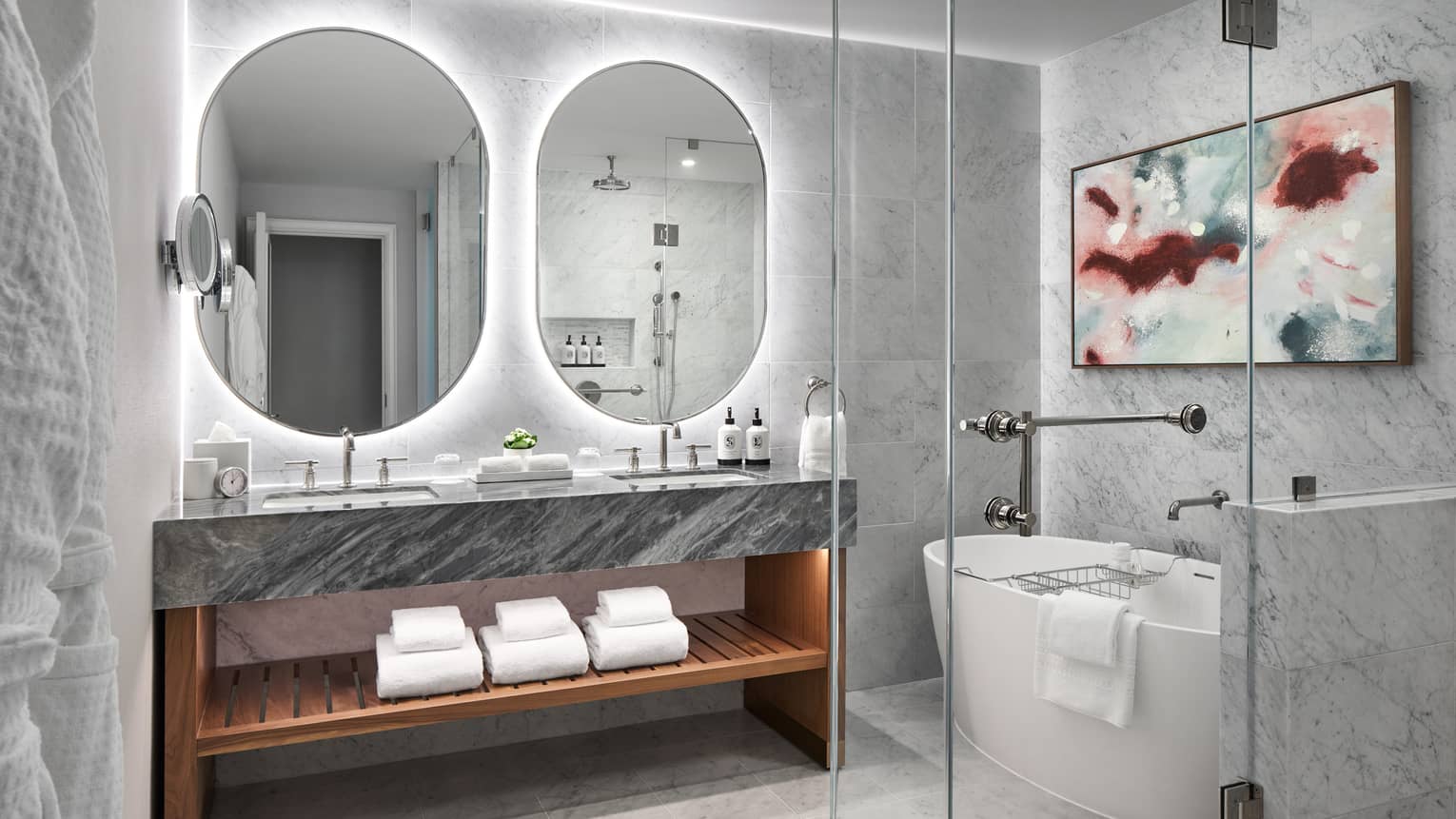 Hotel suite bathroom with luxury tub and marble floors and walls, at Four Seasons Hotel Washington, DC