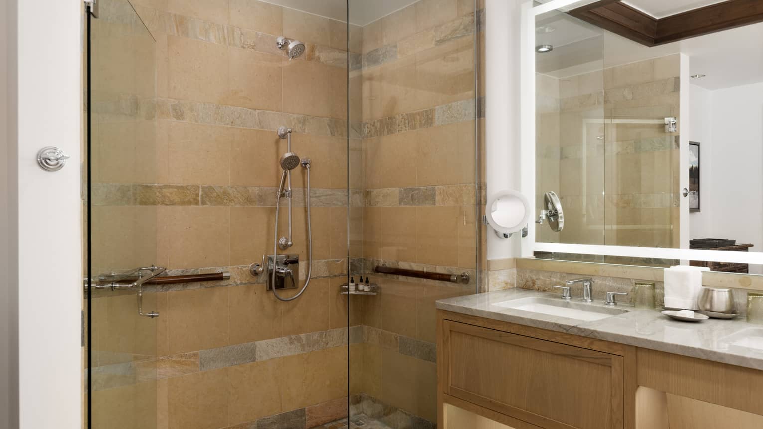 Bathroom with wheel-chair accessible glass shower