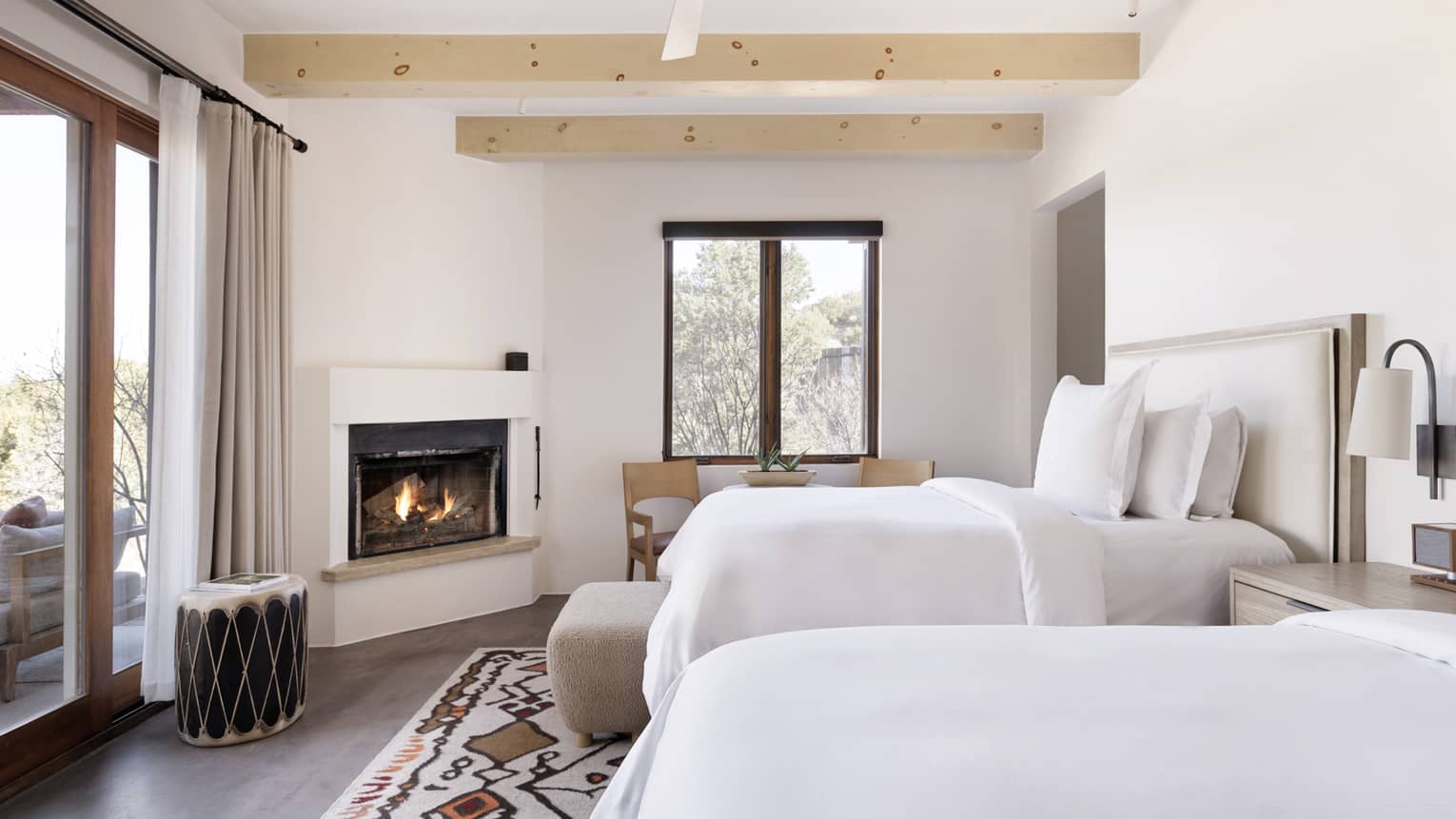 Guest room with two double beds at Four Seasons Resort Santa Fe