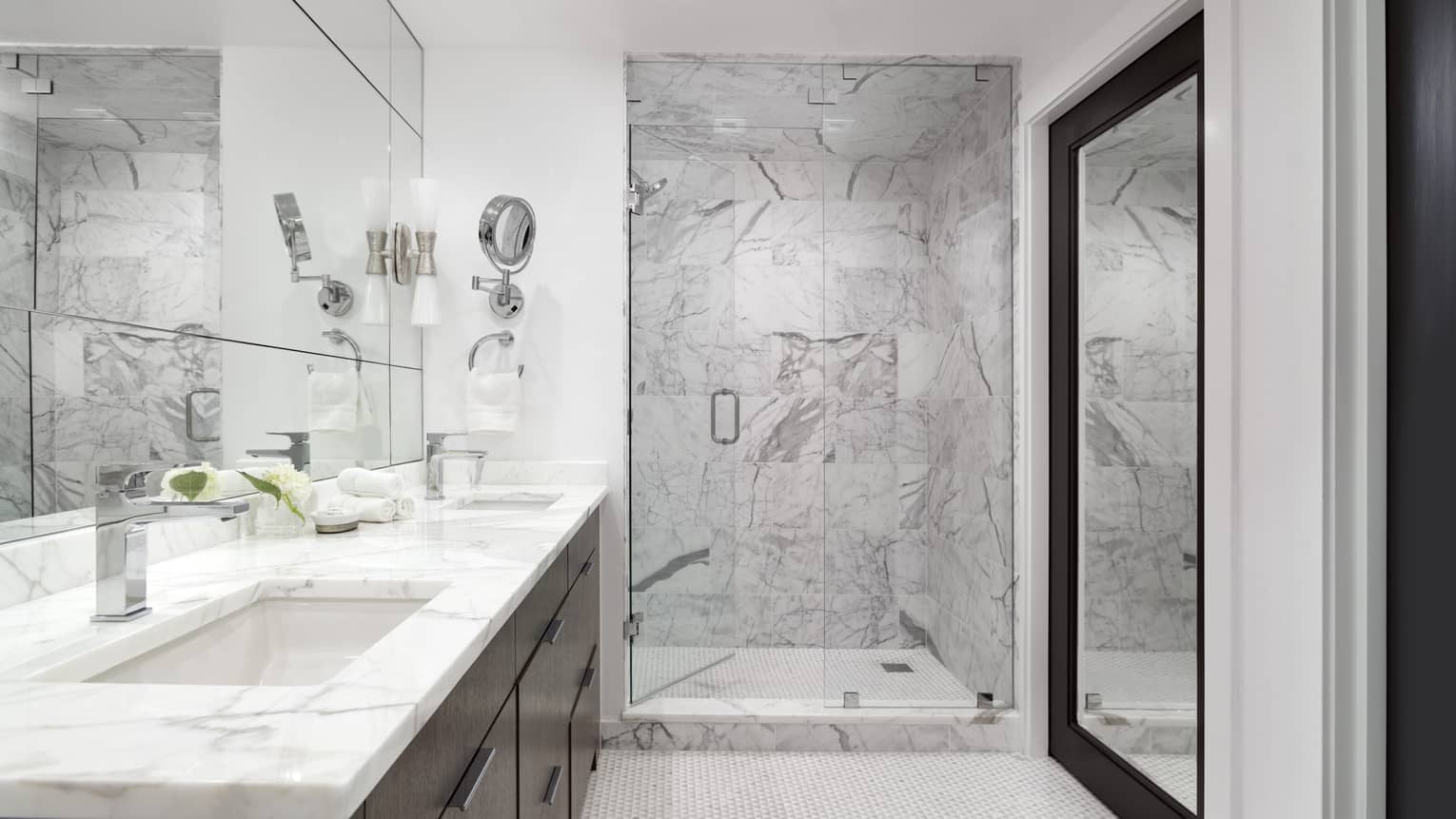 Large bathroom with walk-in white-and-grey marble shower, marble vanity