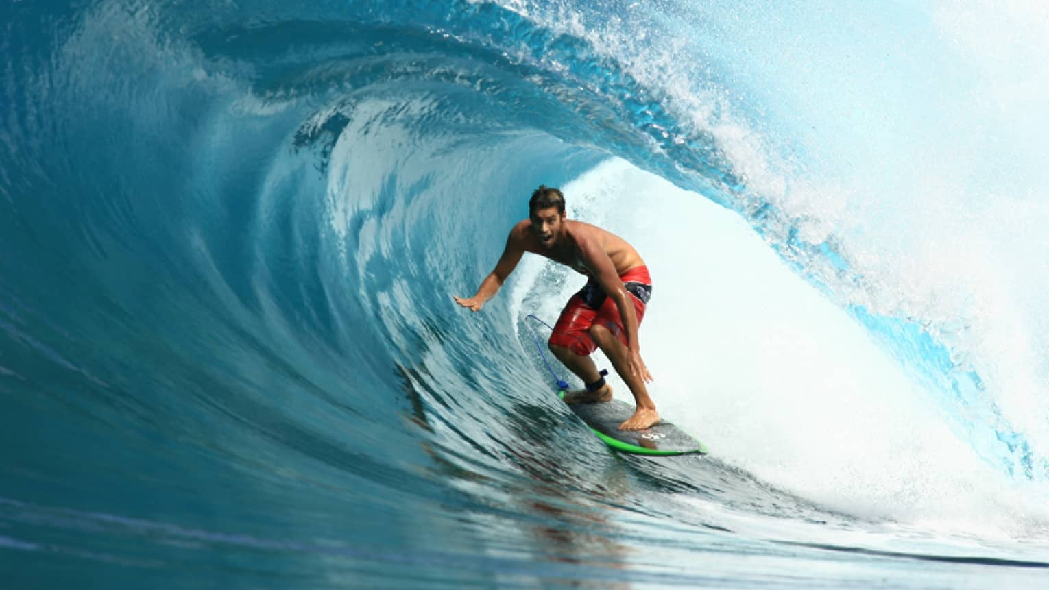 World Champion surfer David Rastovich rides a wave