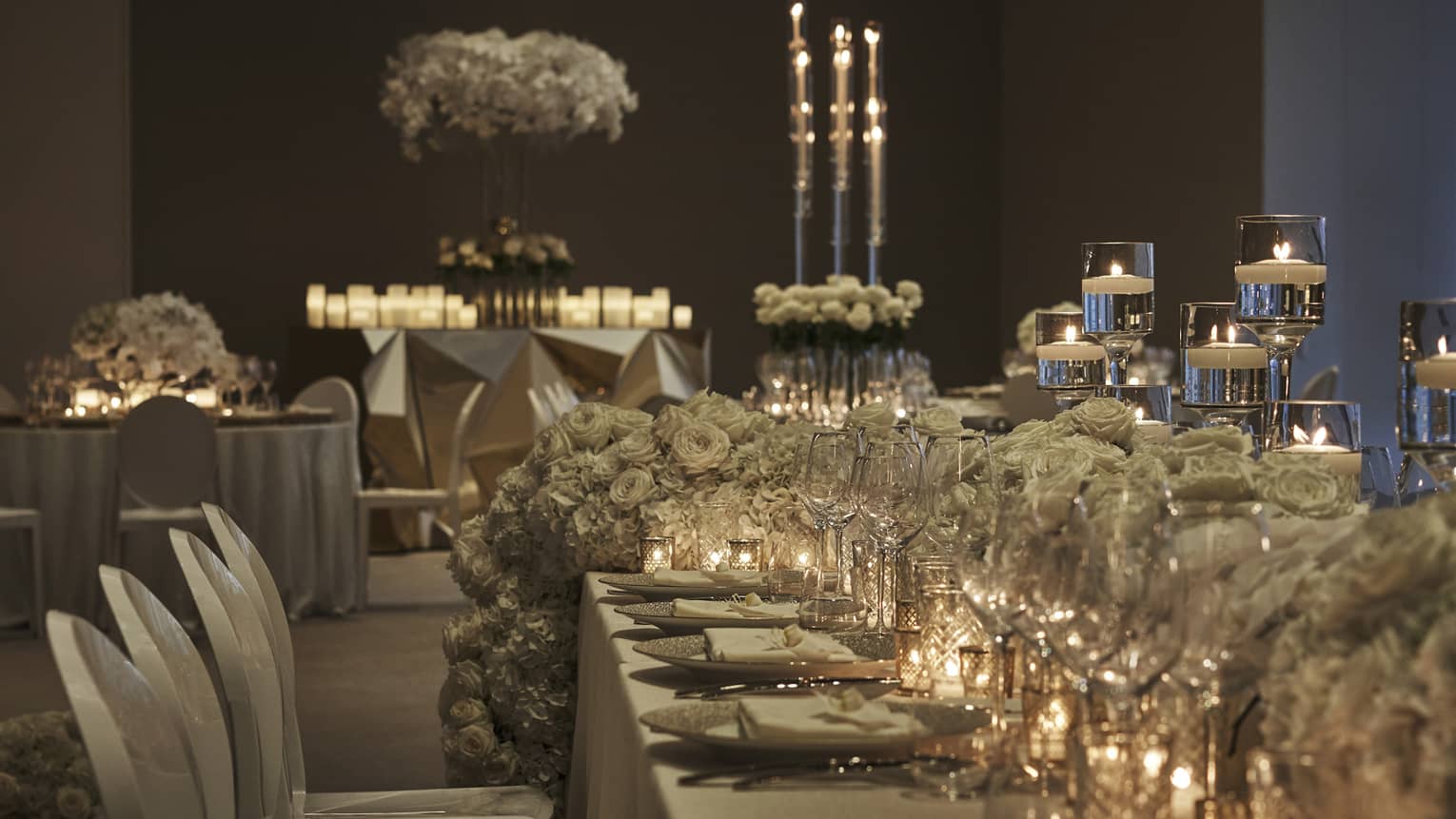 long wedding tables with white and gold theme