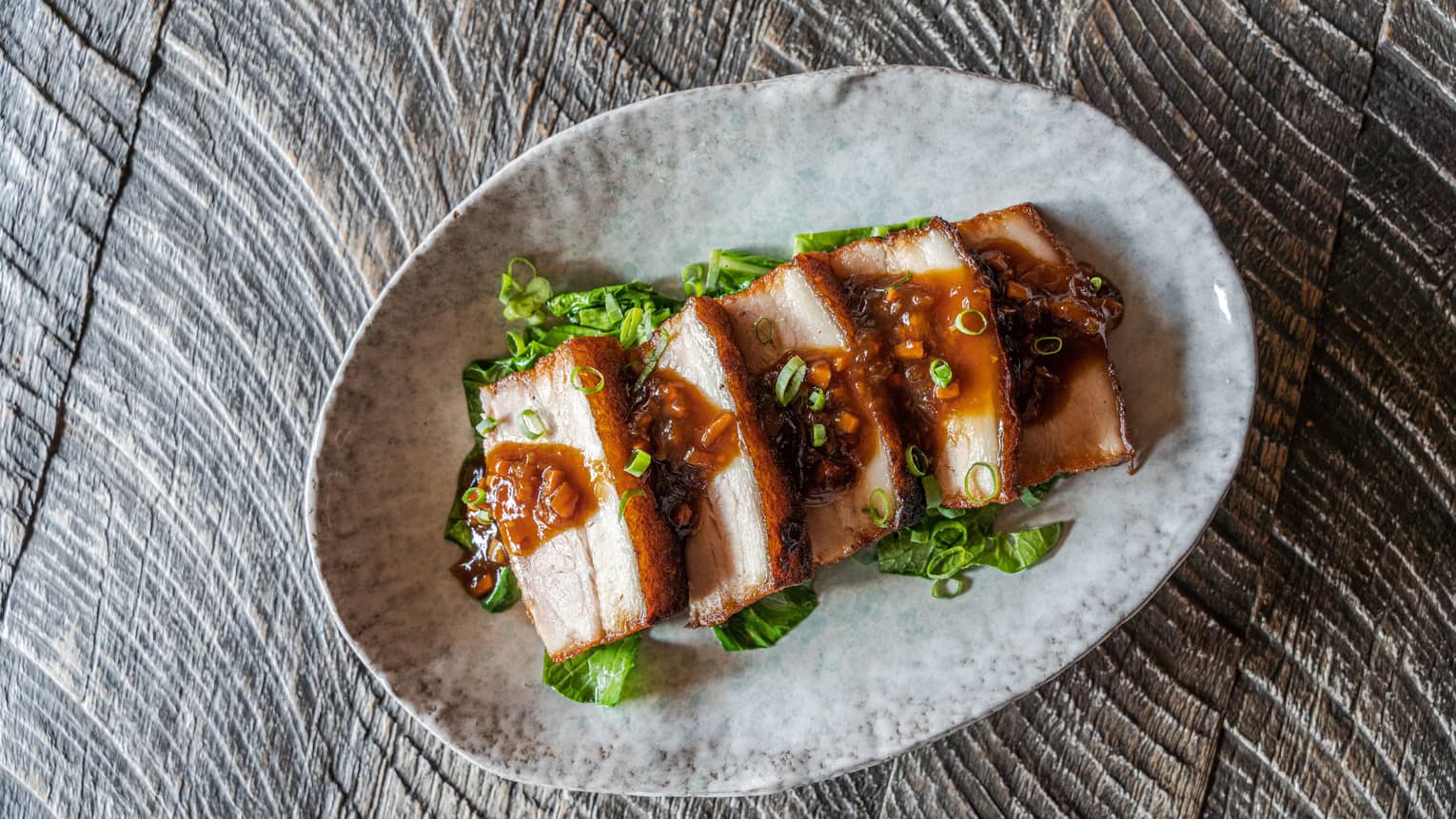 Thit Heo Quay ? Crispy Pork with Bok Choy, Coriander and Black Spicy Sauce