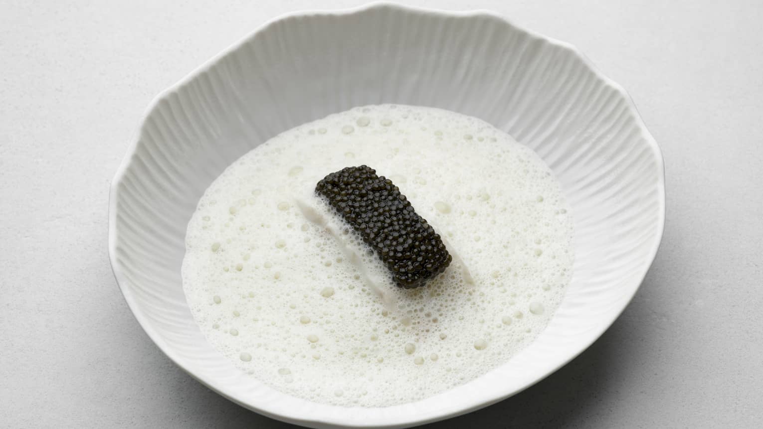 Caviar in foam sauce