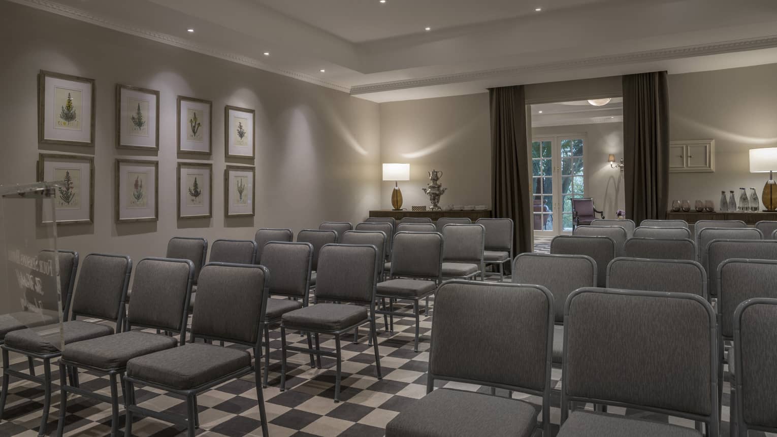 Strelitzia Meeting Room Theatre with rows of grey chairs 