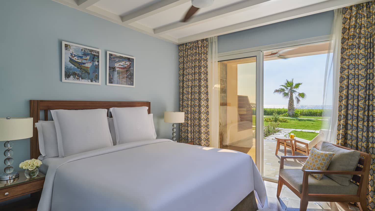 A freshly-made bed in the beach suite overlooking the marsh