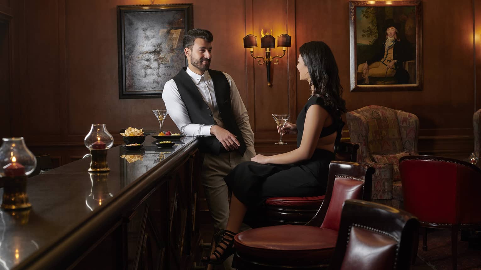 Couple enjoys martinis at Le Bar