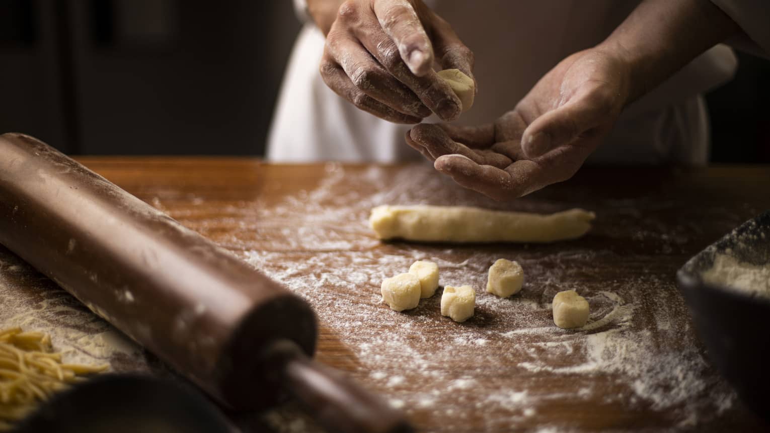 Chef cuts homemade gnocchi