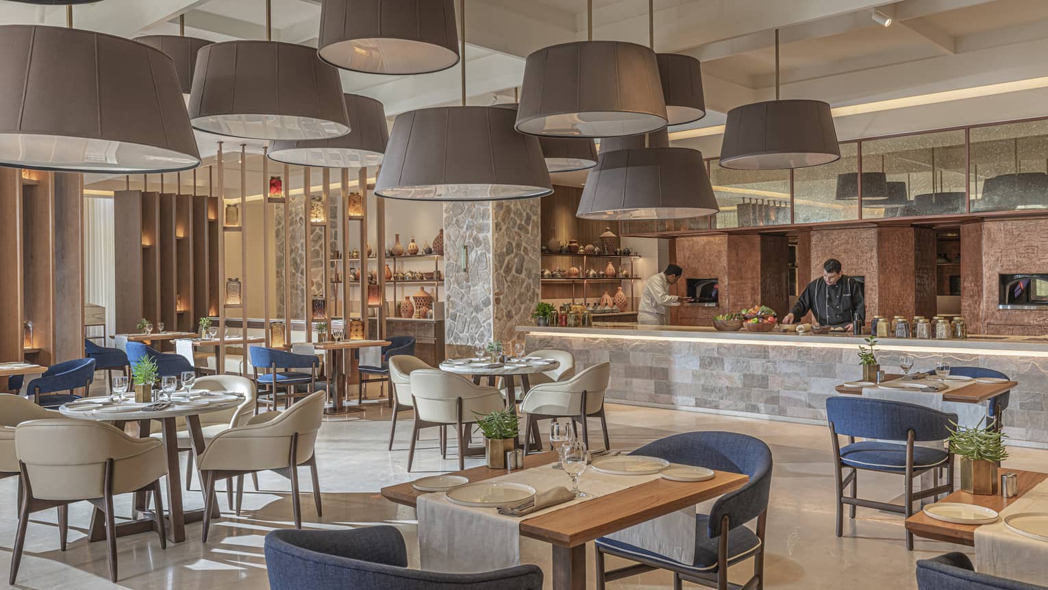 Zitouni restaurant with domed overhead lighting, granite bar, intimate seating, natural light
