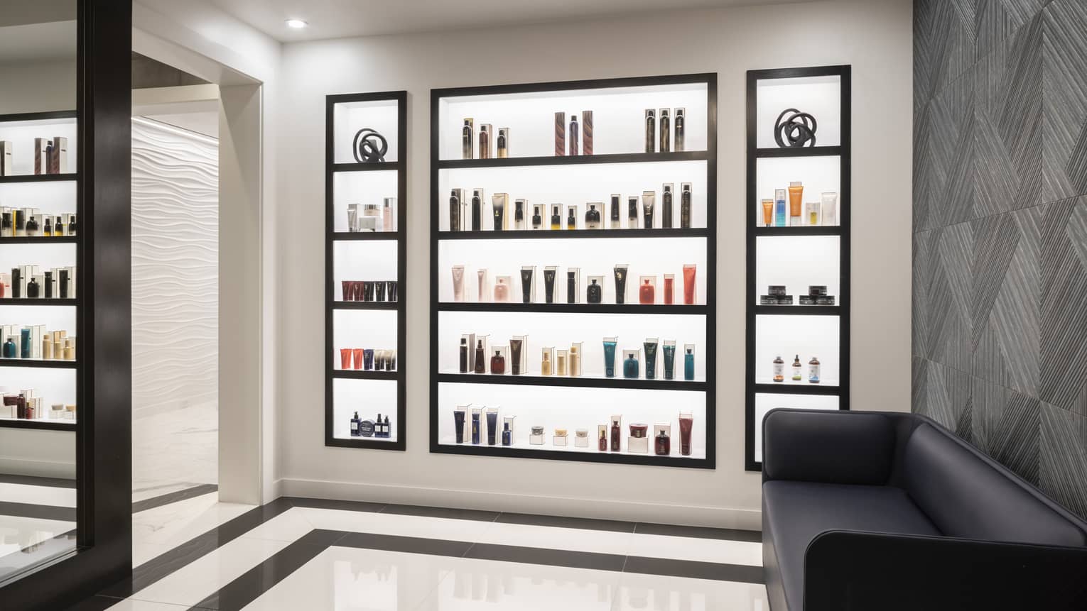 A wall of spa and skin care items for purchase.