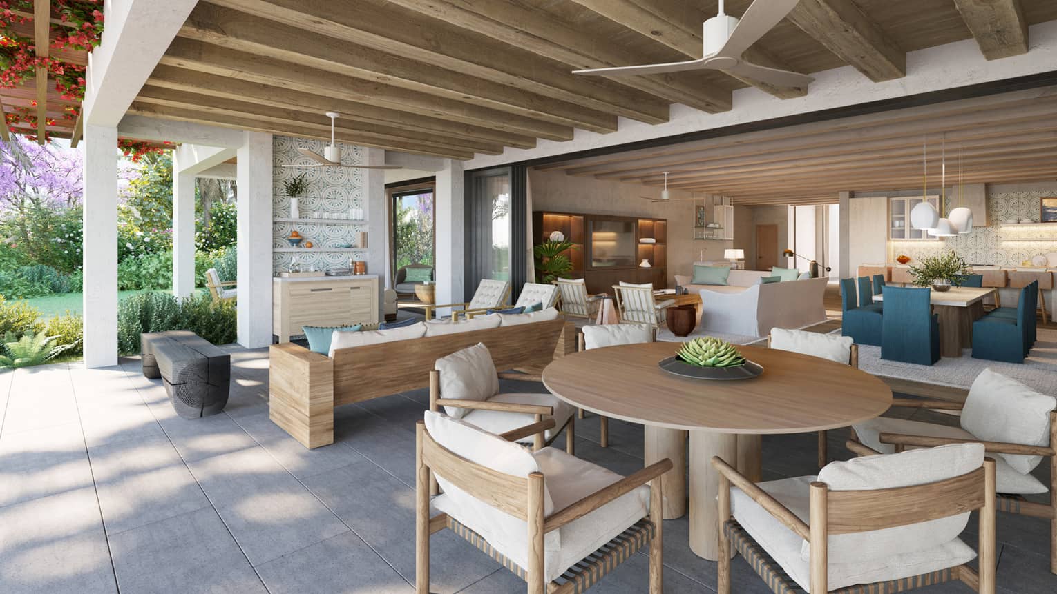 Indoor-outdoor dining and seating area with wooden furniture and accents