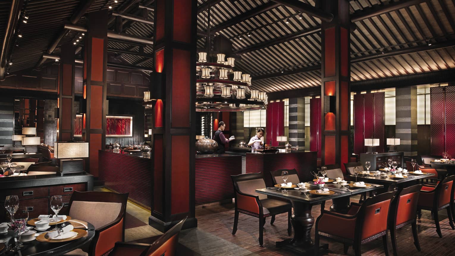 Jin Sha dining room with dark red-and-black decor