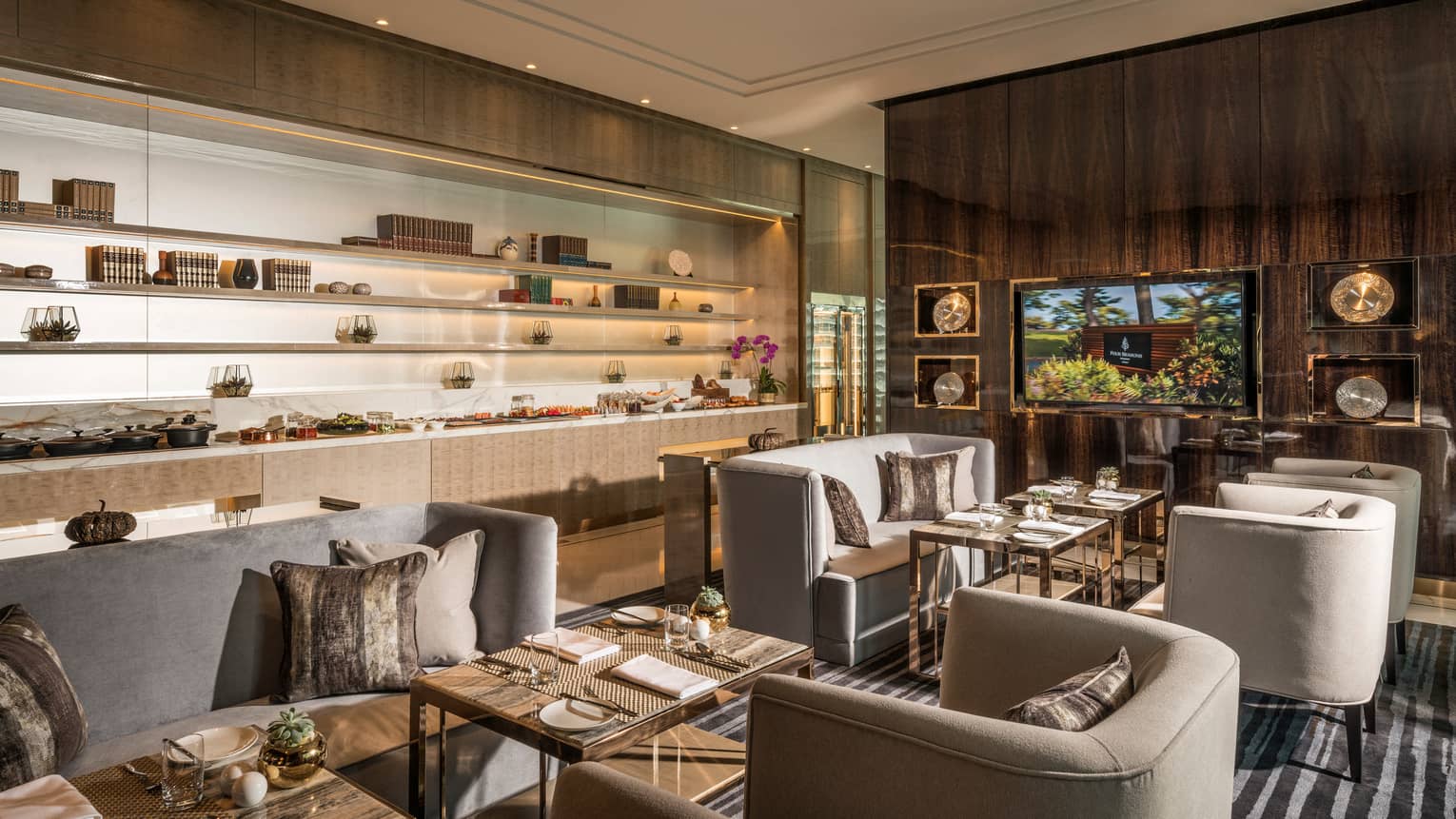 The Executive Club at Four Seasons Hotel Kuala Lumpur offers sleek seats and views of KLCC Park
