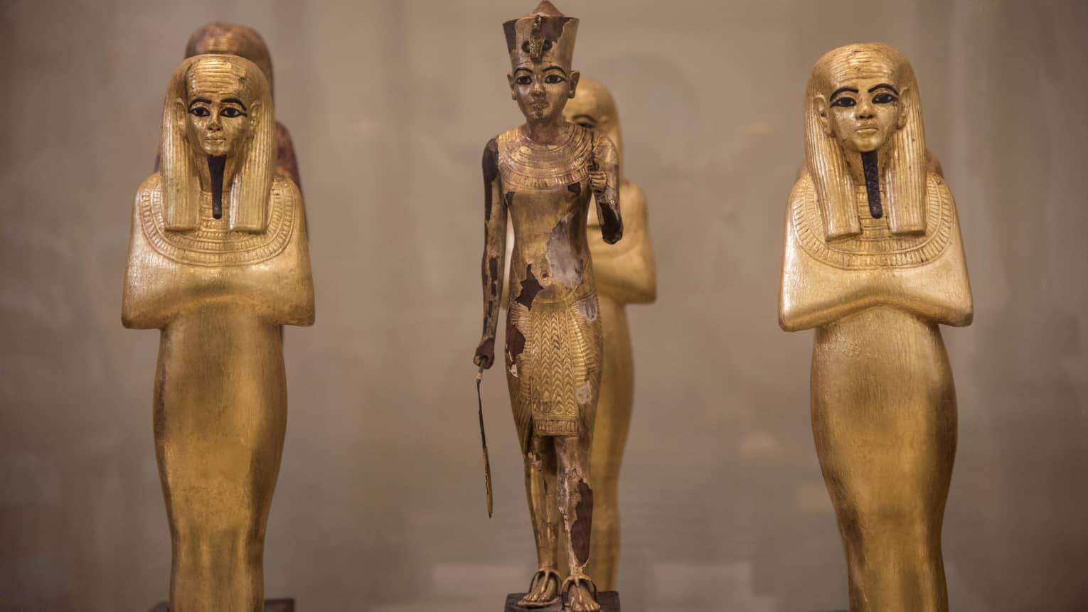 Three Egyptian statues in museum