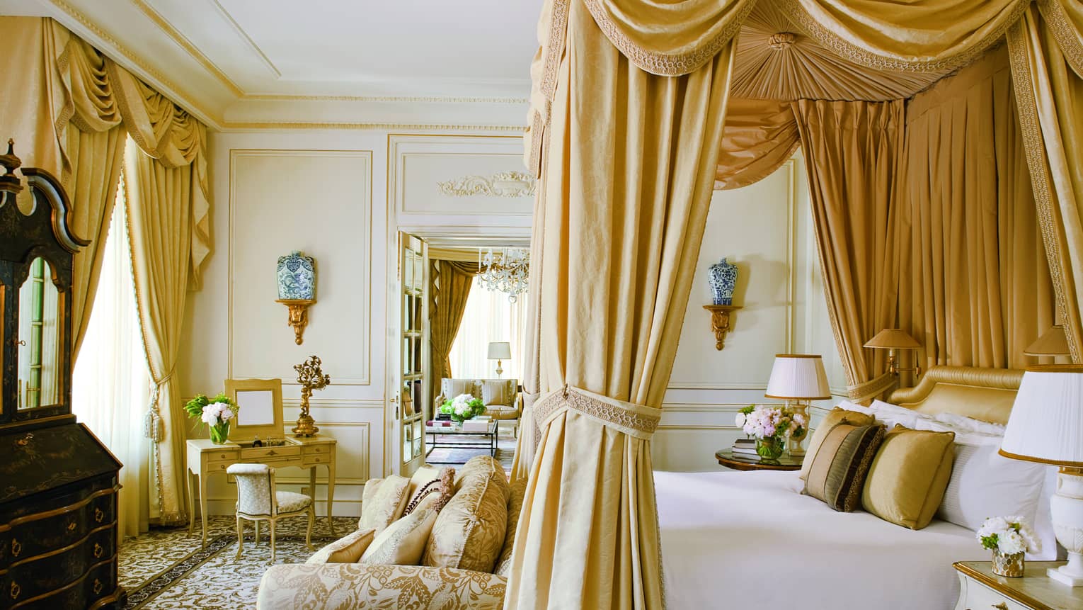 Elaborate Royal Suite, gold upholstery, canopy bed and curtains