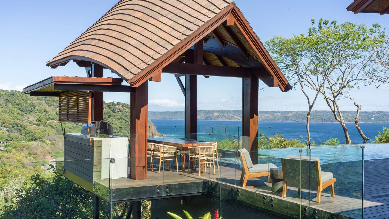 Poolside pavilion with lounge seating