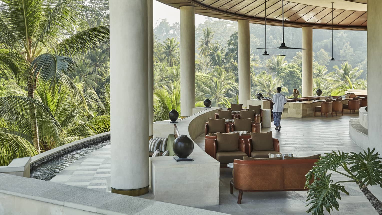 The lobby of the Four Seasons hotel in Bali, overlooking a vast forest