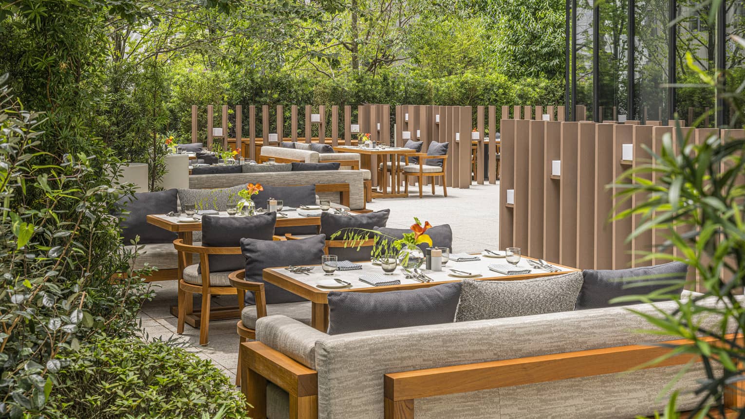 Verdant outdoor dining area of Jardin all-day bistro at Four Seasons Hotel Osaka